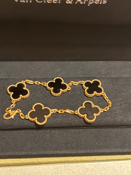 Van Cleef and Arpels Vintage Alhambra bracelet, 5 motifs 18K yellow gold, Onyx