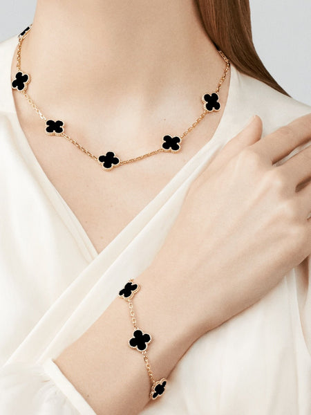 Van Cleef and Arpels Vintage Alhambra bracelet, 5 motifs 18K yellow gold, Onyx - V & G Luxe Boutique